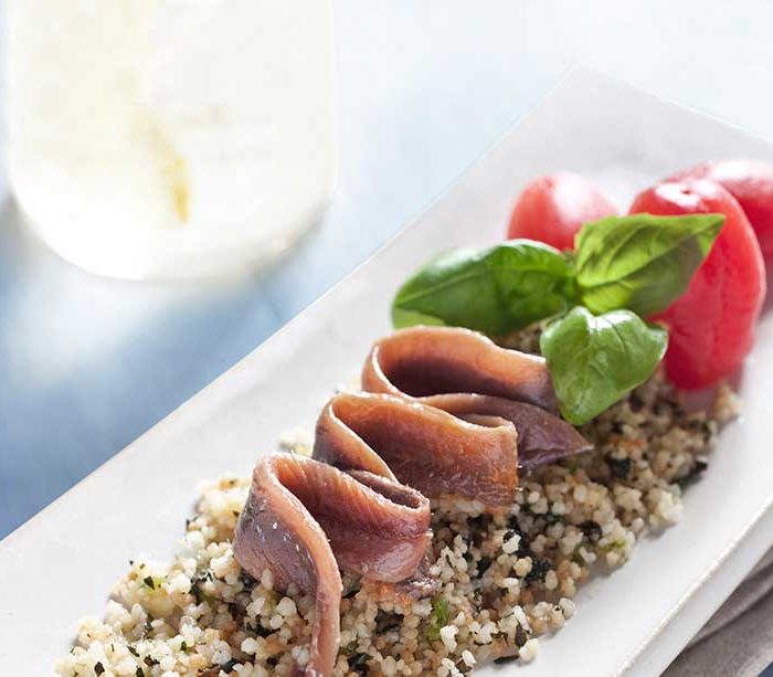 Fresh tabbouleh salad with anchovies