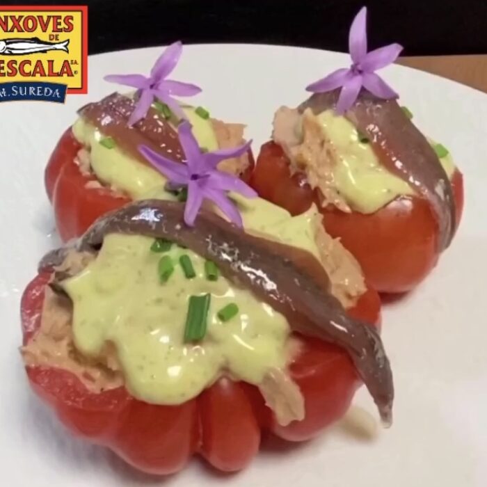 Tomatoes stuffed with tuna belly with anchovies